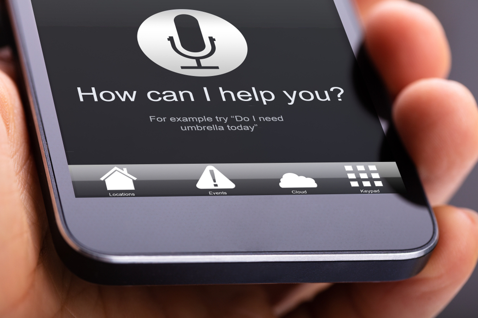 A person using a smartphone to perform a voice search by WAID3 IT Solutions.